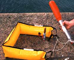 Flotation sling with flashing strobe can be propelled up to 220ft.