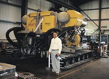 Sonsub ROV Business Development Manager Phil Bremner provides scale for the state-of-the-art Flexjet II cable and pipeline trenching system
