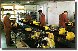 Helmet refurbishing in the Divex Workshop